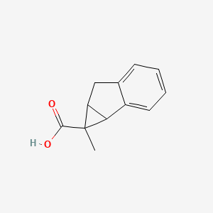 molecular formula C12H12O2 B1435438 1-methyl-1H,1aH,6H,6aH-cyclopropa[a]indene-1-carboxylic acid CAS No. 1803570-83-3
