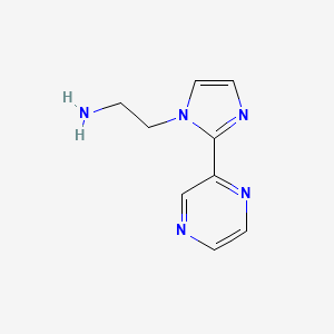 molecular formula C9H11N5 B1435880 2-[2-(pyrazin-2-yl)-1H-imidazol-1-yl]ethan-1-amine CAS No. 2097937-27-2