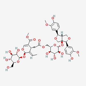 molecular formula C43H54O22 B1436149 methyl 4-[2-[[6-[[3,6-bis(4-hydroxy-3-methoxyphenyl)-3,4,6,6a-tetrahydro-1H-furo[3,4-c]furan-3a-yl]oxy]-3,4,5-trihydroxyoxan-2-yl]methoxy]-2-oxoethyl]-5-ethylidene-6-[3,4,5-trihydroxy-6-(hydroxymethyl)oxan-2-yl]oxy-4H-pyran-3-carboxylate CAS No. 114449-12-6