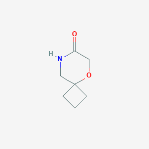 molecular formula C7H11NO2 B1436322 5-Oxa-8-azaspiro[3.5]nonan-7-one CAS No. 1784305-29-8