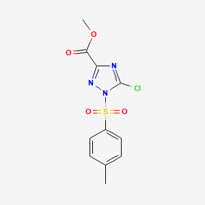 molecular formula C11H10ClN3O4S B1436358 Methyl 5-chloro-1-[(4-methylphenyl)sulfonyl]-1h-1,2,4-triazole-3-carboxylate CAS No. 2096986-33-1