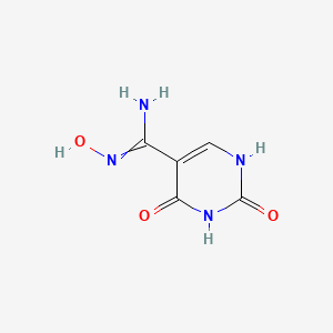 molecular formula C5H6N4O3 B1436868 N'-Hydroxy-2,4-dioxo-1,2,3,4-tetrahydro-5-pyrimidinecarboximidamide CAS No. 468067-75-6