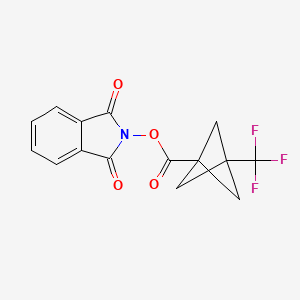 molecular formula C15H10F3NO4 B1436972 1,3-Dioxoisoindolin-2-yl 3-(trifluoromethyl)bicyclo[1.1.1]pentane-1-carboxylate CAS No. 2248286-24-8