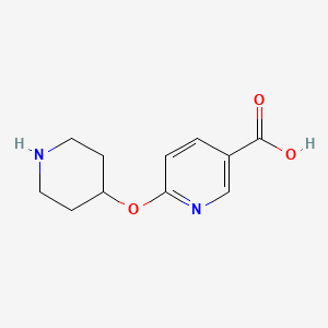 molecular formula C11H14N2O3 B1437669 6-(Piperidin-4-yloxy)nicotinic acid CAS No. 1086379-90-9