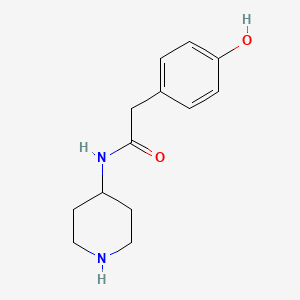 molecular formula C13H18N2O2 B1438285 2-(4-hydroxyphenyl)-N-(piperidin-4-yl)acetamide CAS No. 1097827-25-2