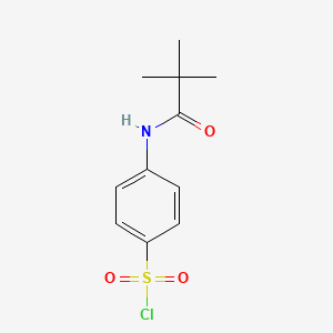 molecular formula C11H14ClNO3S B1438372 4-[(2,2-二甲基丙酰)氨基]苯磺酰氯 CAS No. 438191-85-6