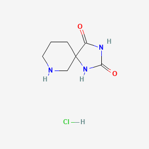 molecular formula C7H12ClN3O2 B1438384 1,3,7-Triazaspiro[4.5]decane-2,4-dione hydrochloride CAS No. 28937-09-9