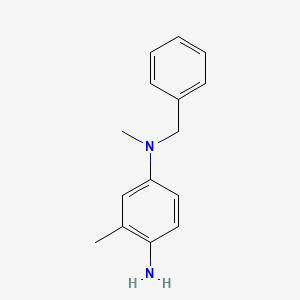 molecular formula C15H18N2 B1438709 N1-Benzyl-N1,3-dimethylbenzene-1,4-diamine CAS No. 105295-86-1