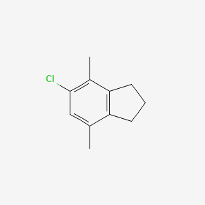 molecular formula C11H13Cl B14387577 5-Chloro-4,7-dimethyl-2,3-dihydro-1H-indene CAS No. 88632-78-4
