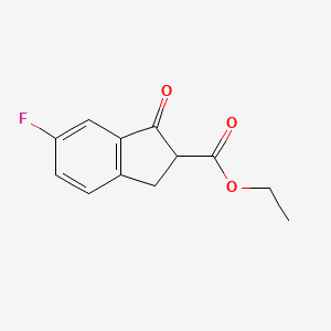 molecular formula C12H11FO3 B14388943 Ethyl 6-fluoro-1-oxo-2,3-dihydro-1H-indene-2-carboxylate CAS No. 89445-52-3
