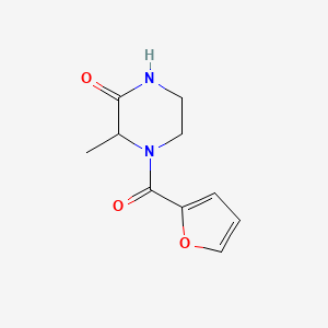 molecular formula C10H12N2O3 B1439178 4-(Furan-2-carbonyl)-3-methylpiperazin-2-one CAS No. 1103994-40-6