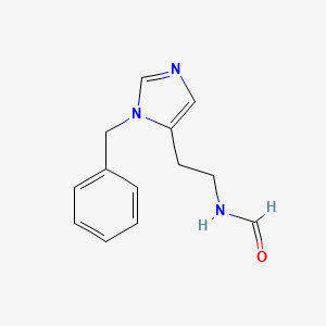 molecular formula C13H15N3O B14393532 N-[2-(1-Benzyl-1H-imidazol-5-yl)ethyl]formamide CAS No. 89912-17-4