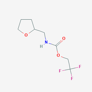 2,2,2-trifluoroethyl N-(oxolan-2-ylmethyl)carbamate
