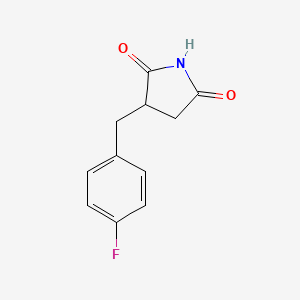 molecular formula C11H10FNO2 B1440769 3-[(4-Fluorophenyl)methyl]pyrrolidine-2,5-dione CAS No. 1267316-35-7
