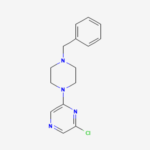 molecular formula C15H17ClN4 B1441072 1-Benzyl-4-(6-chloro-2-pyrazinyl)piperazine CAS No. 1219967-50-6