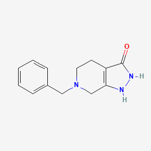 molecular formula C13H15N3O B1441208 6-Benzyl-4,5,6,7-tetrahydro-1H-pyrazolo[3,4-c]pyridin-3(2H)-one CAS No. 909187-64-0