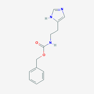 molecular formula C13H15N3O2 B144138 Benzyl [2-(1H-imidazol-5-yl)ethyl]carbamate CAS No. 74058-75-6