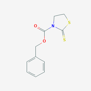 molecular formula C11H11NO2S2 B144140 苄基 2-硫代亚甲基-1,3-噻唑烷-3-羧酸酯 CAS No. 74058-68-7