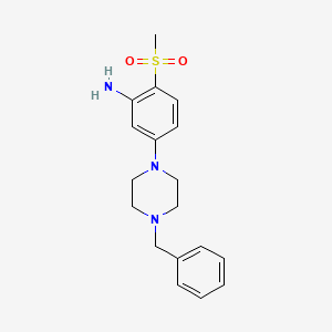 molecular formula C18H23N3O2S B1441975 5-(4-苄基-1-哌嗪基)-2-(甲基磺酰基)-苯胺 CAS No. 1219972-42-5