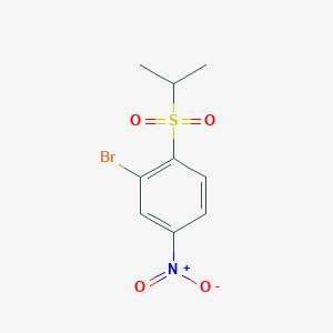molecular formula C9H10BrNO4S B1442394 Benzene, 2-bromo-1-[(1-methylethyl)sulfonyl]-4-nitro- CAS No. 900174-33-6