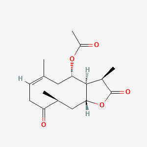 molecular formula C17H24O5 B14433133 Cyclodeca(b)furan-2,9(3H,4H)-dione, 4-(acetyloxy)-3a,5,8,10,11,11a-hexahydro-3,6,10-trimethyl-, (3R,3aS,4S,6E,10S,11aR)- CAS No. 75911-34-1