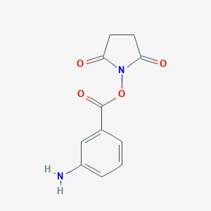 molecular formula C11H10N2O4 B144337 N-(3-Aminobenzoyloxy)succinimide CAS No. 132445-63-7