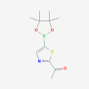 molecular formula C11H16BNO3S B1443636 1-[5-(4,4,5,5-Tetramethyl-1,3,2-dioxaborolan-2-yl)-1,3-thiazol-2-yl]ethanone CAS No. 1452577-24-0