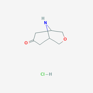 molecular formula C7H12ClNO2 B1443719 3-Oxa-9-azabicyclo[3.3.1]nonan-7-one hydrochloride CAS No. 1126795-00-3