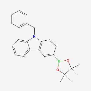 molecular formula C25H26BNO2 B1443852 9-Benzyl-3-(4,4,5,5-tetramethyl-[1,3,2]dioxaborolan-2-yl)-9H-carbazole CAS No. 1357387-29-1