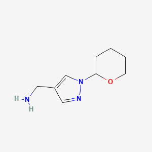 molecular formula C9H15N3O B1444730 (1-(tetrahydro-2H-pyran-2-yl)-1H-pyrazol-4-yl)methanamine CAS No. 1038392-15-2