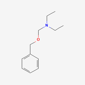 molecular formula C12H19NO B14461293 N-[(Benzyloxy)methyl]-N-ethylethanamine CAS No. 67232-11-5