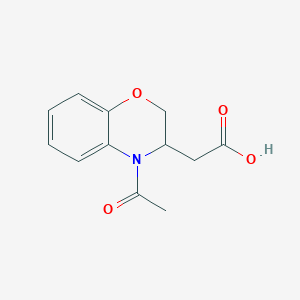 molecular formula C12H13NO4 B1446233 2-(4-acetyl-3,4-dihydro-2H-benzo[b][1,4]oxazin-3-yl)acetic acid CAS No. 1955540-12-1