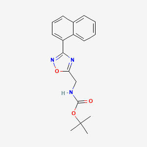 molecular formula C18H19N3O3 B1446287 (3-Naphthalen-1-yl-[1,2,4]oxadiazol-5-ylmethyl)-carbamic acid tert-butyl ester CAS No. 1858256-38-8