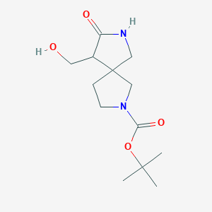 molecular formula C13H22N2O4 B1446352 tert-Butyl 9-(hydroxymethyl)-8-oxo-2,7-diazaspiro[4.4]nonane-2-carboxylate CAS No. 1445950-79-7