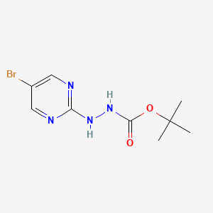 molecular formula C9H13BrN4O2 B1446400 tert-Butyl 2-(5-bromopyrimidin-2-yl)hydrazinecarboxylate CAS No. 1452182-34-1