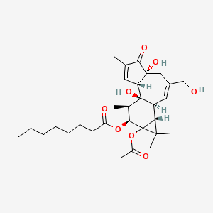molecular formula C30H44O8 B14464365 Octanoic acid, 9a-(acetyloxy)-1a,1b,4,4a,5,7a,7b,8,9,9a-decahydro-4a,7b-dihydroxy-3-(hydroxymethyl)-1,1,6,8-tetramethyl-5-oxo-1H-cyclopropa(3,4)benz(1,2-e)azulen-9-yl ester, (1aR-(1aalpha,1bbeta,4abeta,7aalpha,7balpha,8alpha,9beta,9aalpha))- CAS No. 72416-83-2