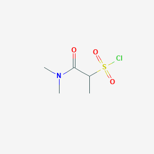 molecular formula C5H10ClNO3S B1446583 1-(Dimethylcarbamoyl)ethane-1-sulfonyl chloride CAS No. 1601248-25-2