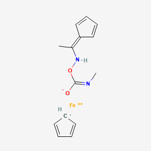 molecular formula C14H16FeN2O2 B14466999 Ferrocene, (1-((((methylamino)carbonyl)oxy)imino)ethyl)- CAS No. 74006-13-6