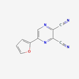 molecular formula C10H4N4O B14468797 5-(Furan-2-yl)pyrazine-2,3-dicarbonitrile CAS No. 72545-80-3
