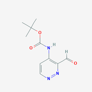 molecular formula C10H13N3O3 B1446928 (3-Formyl-pyridazin-4-yl)-carbamic acid tert-butyl ester CAS No. 1414958-85-2