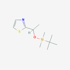 molecular formula C11H21NOSSi B1447046 2-{1-[(Tert-butyldimethylsilyl)oxy]ethyl}-1,3-thiazole CAS No. 1803586-34-6