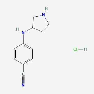 molecular formula C11H14ClN3 B1447130 4-[(Pyrrolidin-3-yl)amino]benzonitrile hydrochloride CAS No. 1803610-65-2