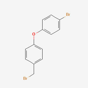 molecular formula C13H10Br2O B1447521 1-Bromo-4-[4-(bromomethyl)phenoxy]benzene CAS No. 1344045-86-8