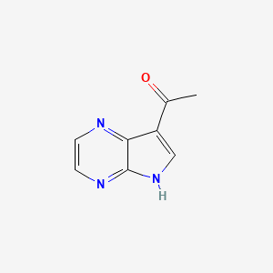 molecular formula C8H7N3O B1447611 1-(5H-Pyrrolo[2,3-b]pyrazin-7-yl)ethanone CAS No. 1522641-39-9
