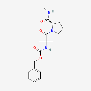 molecular formula C18H25N3O4 B14477685 N-[(Benzyloxy)carbonyl]-2-methylalanyl-N-methyl-L-prolinamide CAS No. 70904-75-5