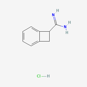 molecular formula C9H11ClN2 B1448060 Bicyclo[4.2.0]octa-1,3,5-triene-7-carboximidamide hydrochloride CAS No. 182743-89-1