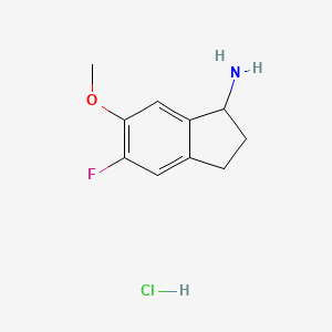 molecular formula C10H13ClFNO B1448221 5-fluoro-6-methoxy-2,3-dihydro-1H-inden-1-amine hydrochloride CAS No. 1803611-94-0