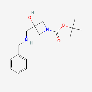 molecular formula C16H24N2O3 B1448728 Tert-butyl 3-[(benzylamino)methyl]-3-hydroxyazetidine-1-carboxylate CAS No. 1803589-47-0