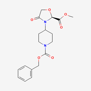 molecular formula C18H22N2O6 B1449322 Methyl (2S)-3-{1-[(benzyloxy)carbonyl]piperidin-4-yl}-4-oxo-1,3-oxazolidine-2-carboxylate CAS No. 1706436-07-8