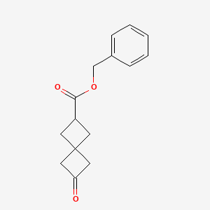 molecular formula C15H16O3 B1449331 Benzyl 6-oxospiro[3.3]heptane-2-carboxylate CAS No. 1447942-35-9